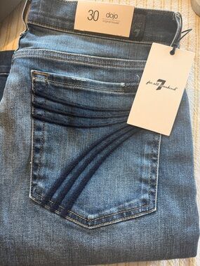 7 For All Mankind Medium Blue Flare Jeans with Dark Embroidered Arcs